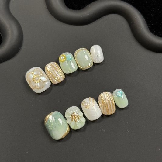 Super Short Oval Light Green Press-On Nails with Handmade Floral and Gold Line Design | Removable & Reusable | Free Tool Kit Included