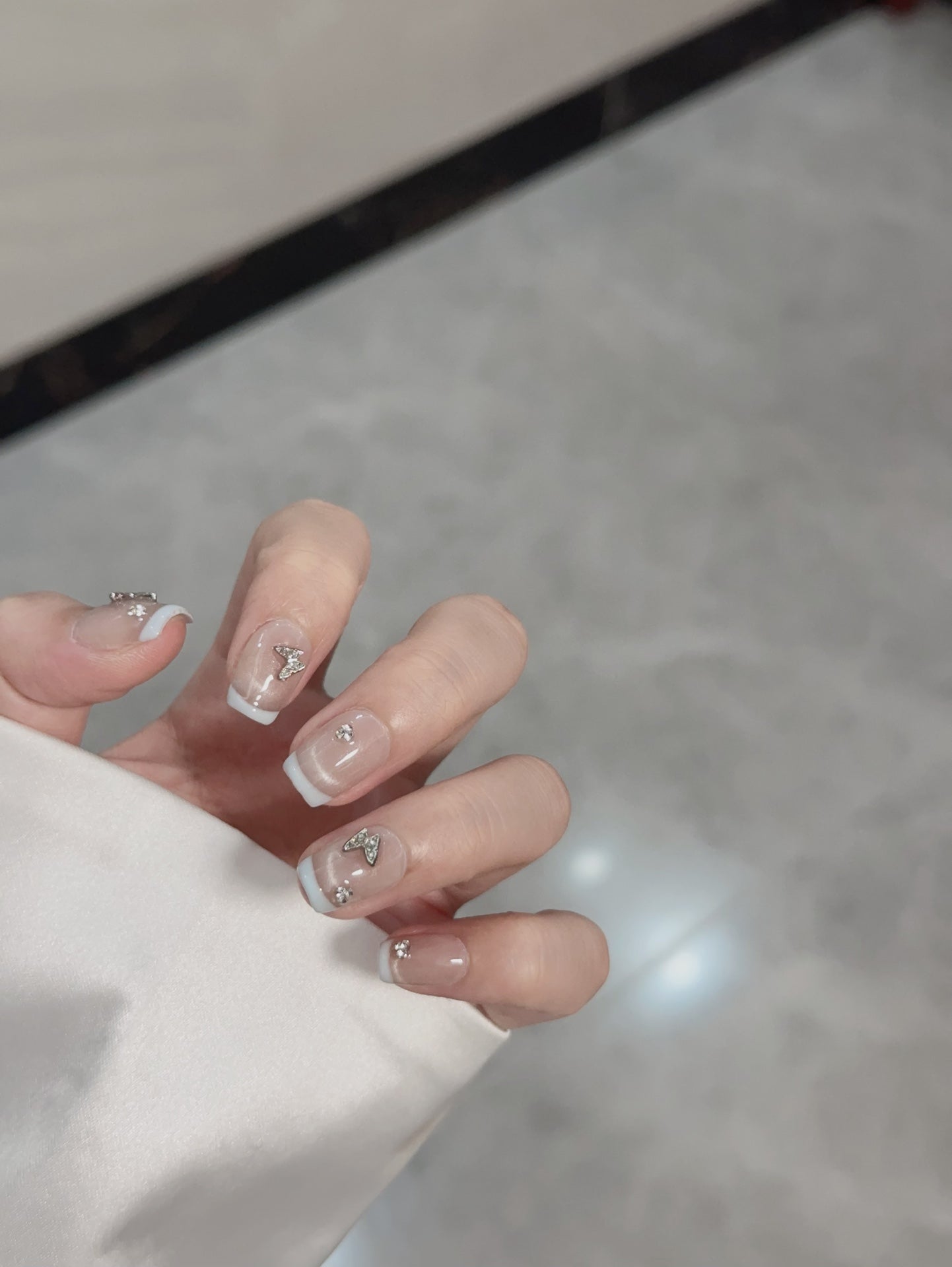 Super Short Square Light Blue French Tip & Butterfly Accent Handmade Press-On Nails | Removable and Reusable | Free Tool Kit Included