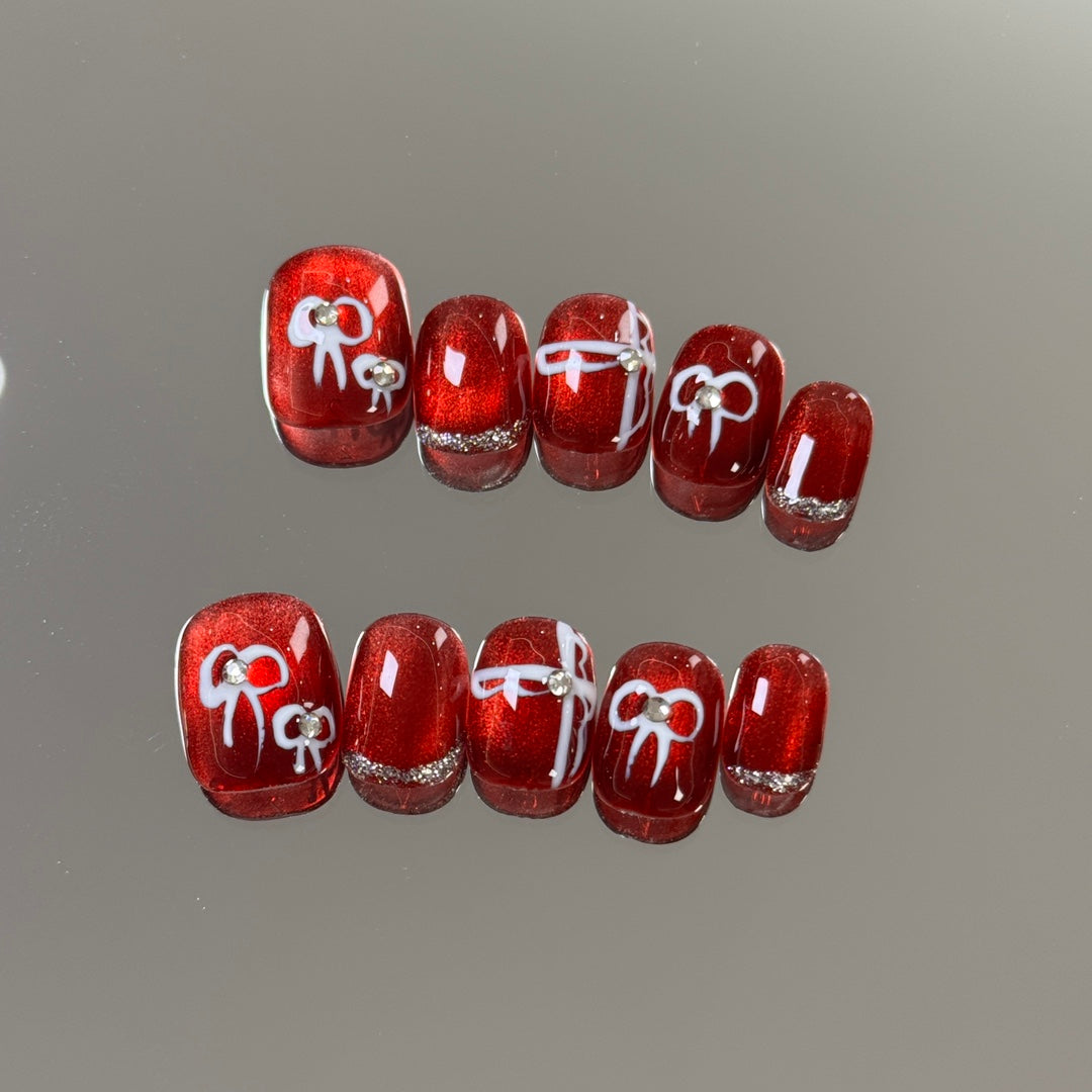 Ultra-Short Round Red Cat Eye &  Hand-Painted White Bow Handmade Press-On Nails | Removable & Reusable with Free Tool Kit