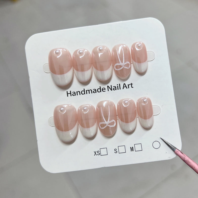 Short Oval Hand-Painted French Moonlight Pink and White Bow Handmade Press-On Nails | Removable and Reusable | Free Tool Kit Included